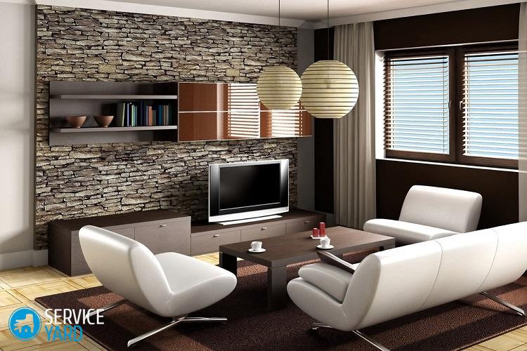 Как оформить стену в гостиной над диваном?