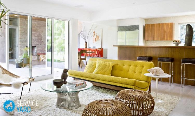 Как оформить стену в гостиной над диваном?