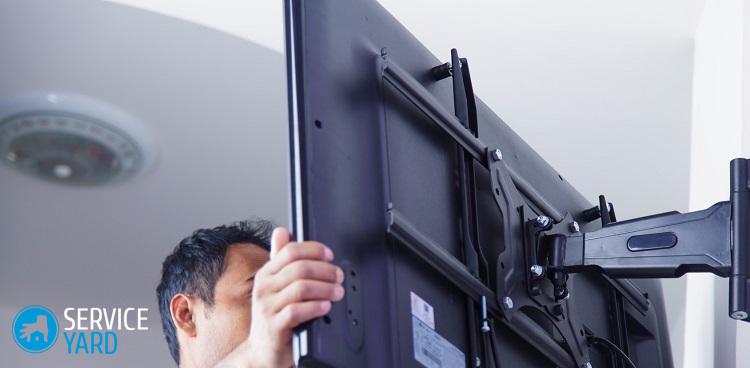 Как повесить телевизор на стену с кронштейном?