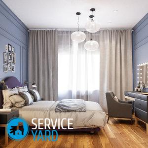 Кровать у окна в спальне — дизайн