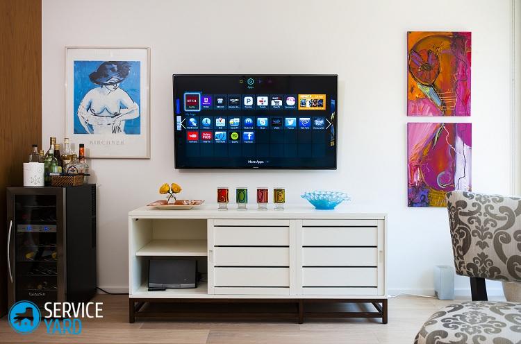 На какой высоте вешать телевизор на стену?