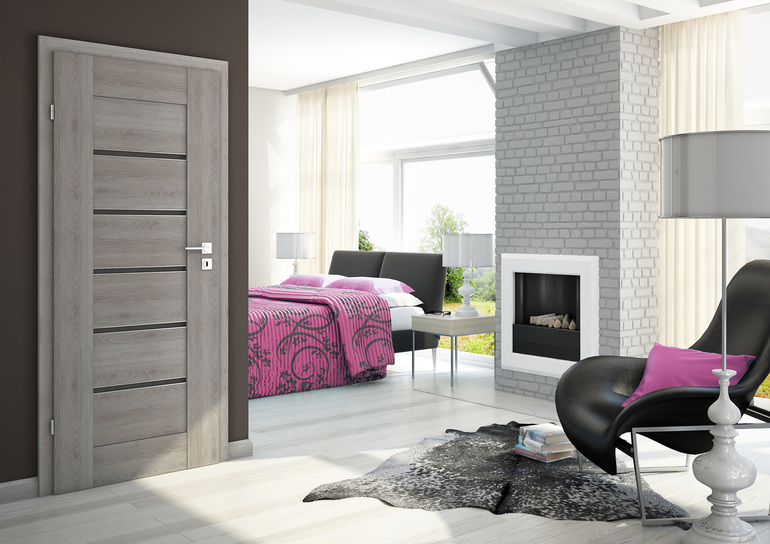 Серые межкомнатные и входные двери в интерьере квартиры