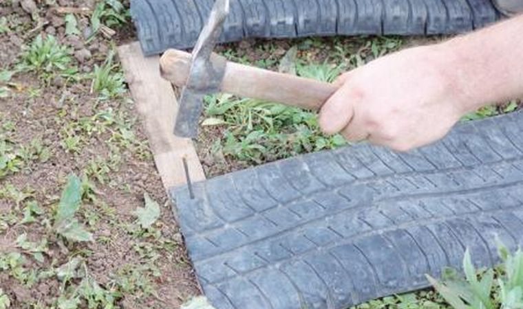 Вироби зі старих автомобільних шин своїми руками — доріжка, клумба, ставок, лебідь, пісочниця, меблі, жаба: інструкція